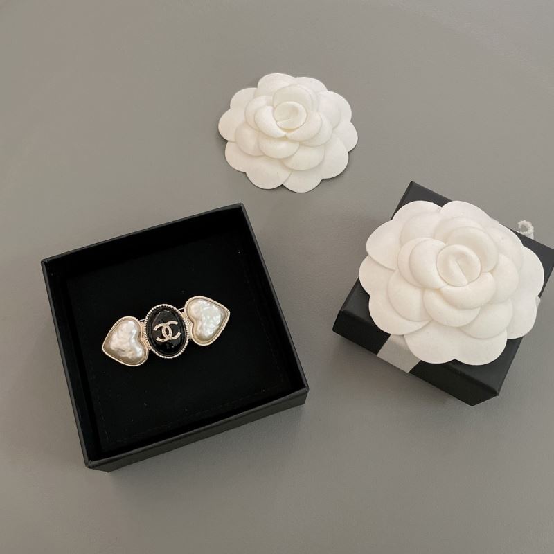 Ch*el brooches